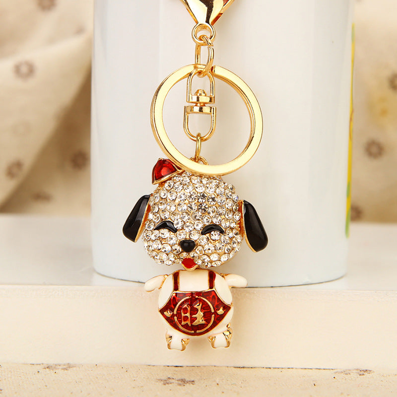 Korean version creative couple diamond studded puppy car keychain women's bag pendant metal keychain ring small gift wholesale