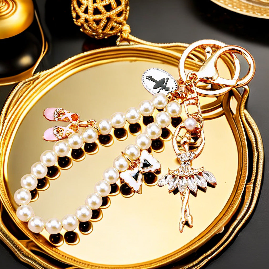 Diamond studded dancing angel car keychain metal cute women's handbag pendant keychain ring pearl pendant gift