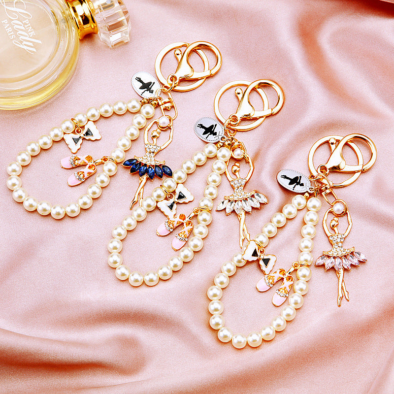 Diamond studded dancing angel car keychain metal cute women's handbag pendant keychain ring pearl pendant gift