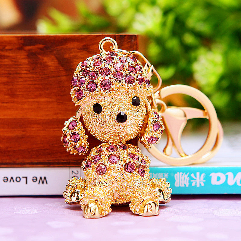 Korean version creative couple diamond studded puppy car keychain women's bag pendant metal keychain ring small gift wholesale