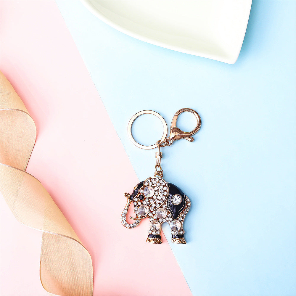 New alloy diamond inlaid cute elephant keychain women's bag accessories creative couple car keychain pendant