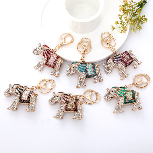 Cross border key pendant cute colored elephant metal car keychain wholesale creative cartoon backpack hanging decoration