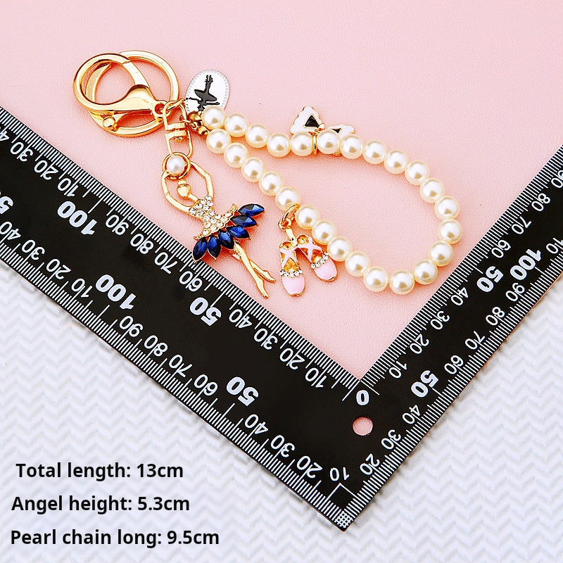 Diamond studded dancing angel car keychain metal cute women's handbag pendant keychain ring pearl pendant gift